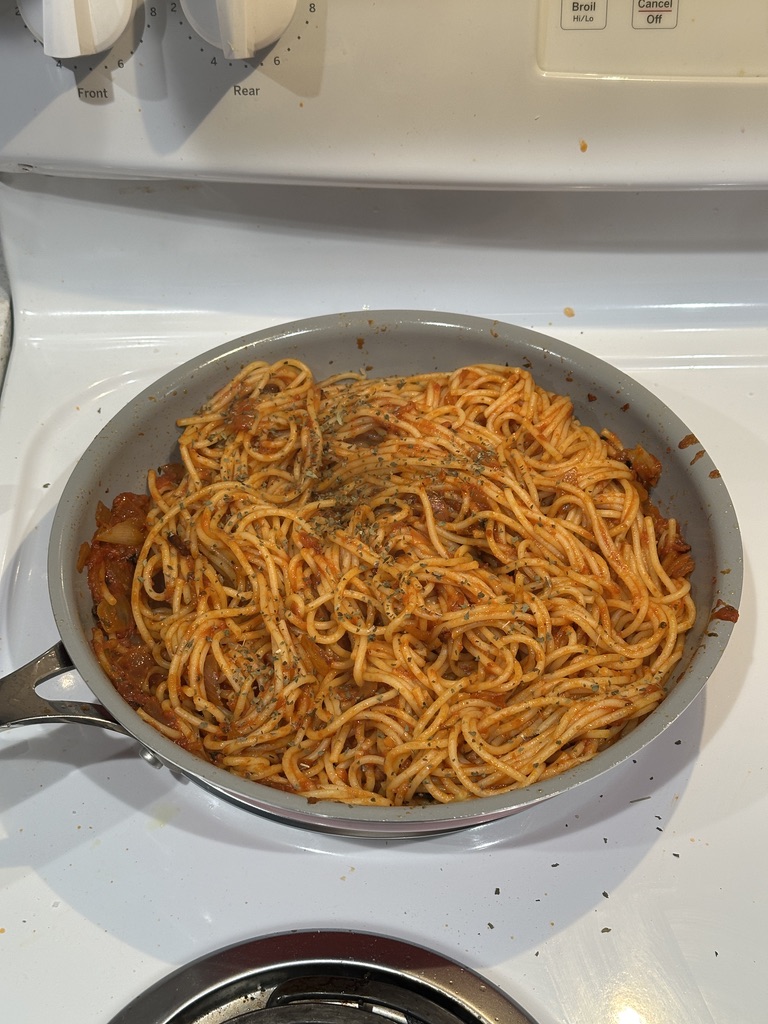 Spaghetti with tomato sauce, a hint of basil